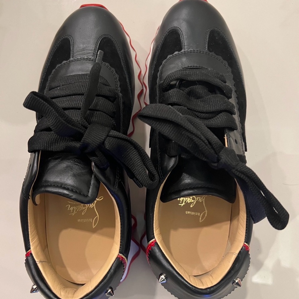Loubishark woman
Sneakers - Calf leather and veau velours - Black - Women